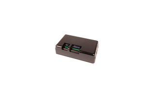Top view of a black electronic component with two visible ports.