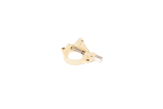 Top view of a mechanical component with a circular base and a metal rod.