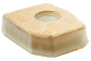 Top view of a rectangular air filter with a central circular opening.