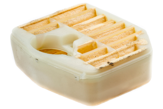 Top view of a used air filter for a mechanical device.