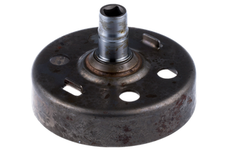 Top view of a metal component with a cylindrical shaft and multiple holes.