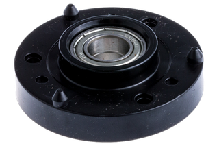 Front view of a mechanical bearing component with mounting holes.