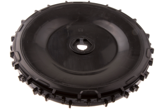 Top view of a large circular plastic component with a central hole, possibly a wheel or gear.