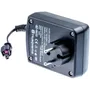 En Husqvarna AC-adapter set ovenfra med stik og stik synligt.
