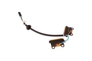 Top view of an ignition coil with attached wiring.