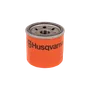 Front view of a spin-on oil filter, studio shot, showing the threaded center and ports.