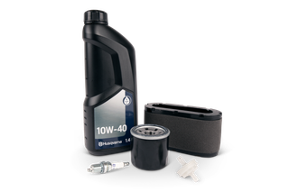 A set of Husqvarna maintenance products including oil, air filter, spark plug, and oil filter.