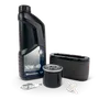 A set of Husqvarna maintenance products including oil, air filter, spark plug, and oil filter.