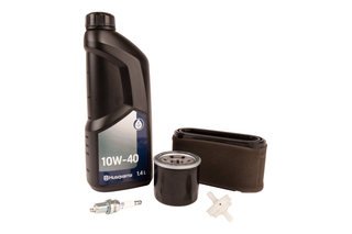 Husqvarna oil, filter, spark plug, and air filter set for engine maintenance.