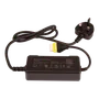 Top view of a Husqvarna Group power adapter with UK plug and safety certifications.