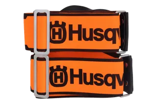 Front view of two Husqvarna-branded adjustable straps with metal buckles.