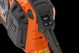 Close-up view of a battery compartment on a Husqvarna product.