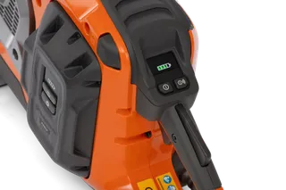 Close-up view of a battery compartment on a Husqvarna product.