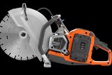 Side view of a Husqvarna power cutter with a large circular blade.