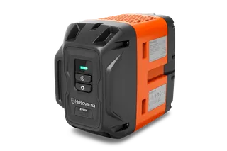 Side view of a Husqvarna B750X battery pack with visible control buttons and indicator lights.