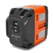 Side view of a Husqvarna B750X battery pack with visible control buttons and indicator lights.