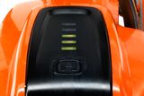 Close-up of a battery indicator on a Husqvarna product.