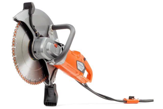 Vue latérale d’une découpeuse Husqvarna Construction avec poignée ergonomique.