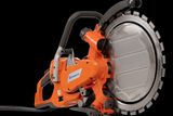 Side view of a Husqvarna power cutter with ergonomic handle and blade.