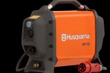 Front view of a Husqvarna PP 70 power pack with visible cables and connectors.