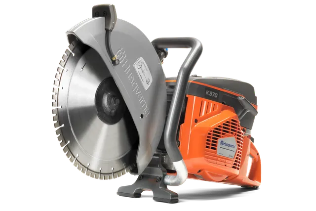 Side view of a Husqvarna K970 power cutter with visible blade and ergonomic handle.