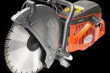 Side view of a Husqvarna K970 power cutter with a large circular blade.