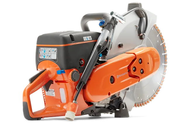 Side view of a Husqvarna power cutter with ergonomic handle and visible blade.