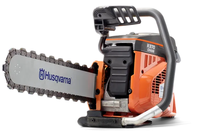 Side view of a Husqvarna K970 chainsaw with visible chain and handle.