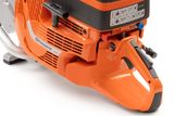 Close-up view of a Husqvarna power cutter showing its control panel and handle.