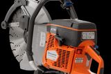 Side view of a Husqvarna K770 power cutter with ergonomic handle and blade.