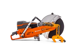 Side view of a Husqvarna power cutter with ergonomic handle and blade.