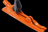 Zijaanzicht van een Husqvarna-constructieaccessoire, waarschijnlijk een geleider of ondersteuningstool.