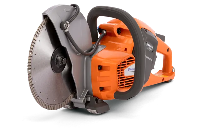 Side view of a Husqvarna power cutter with a circular blade.