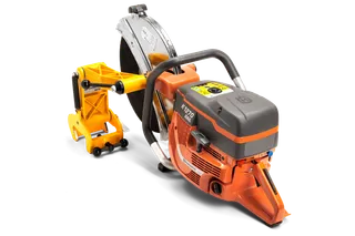 Side view of a Husqvarna power cutter with ergonomic handle and blade guard.