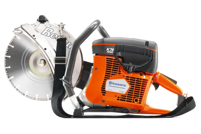 Side view of a Husqvarna power cutter with a large circular blade and ergonomic handle.
