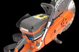 Side view of a Husqvarna fire rescue power cutter with ergonomic handle.