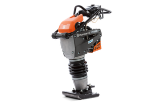 Side view of a Husqvarna LT 6005 compactor with visible branding and components.