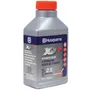 Front view of a Husqvarna XP+ 2-stroke oil bottle with product details visible.