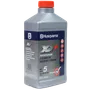 Front view of a Husqvarna XP+ synthetic blend 2-stroke oil bottle.