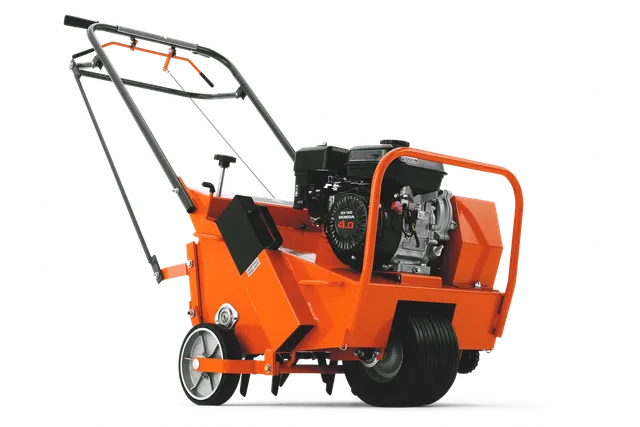 Side view of a construction machine with a visible engine and wheels.