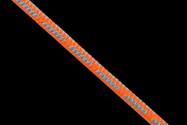 Close-up view of a chainsaw chain with sharp teeth.