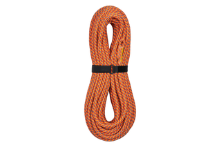 Coiled climbing rope with a black strap for securing.