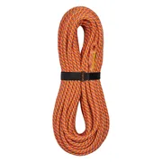 Coiled climbing rope with a black strap for securing.