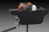 Side view studio image of a powered product on a pole with engine housing, controls and long handle.