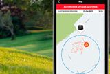 Smartphone displaying a map with geofence alert for an automower outside its designated area.