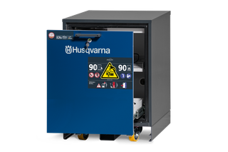 Front view of a Husqvarna storage cabinet with safety warning labels.