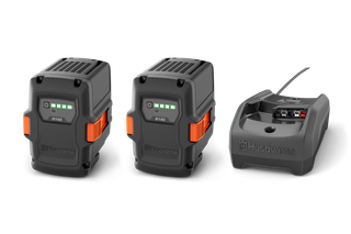 Husqvarna Batteri startkit. En pakke med 2 36 V batterier og 1 oplader fra Husqvarna.
