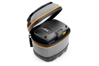 Top view of a Husqvarna battery inside a protective carrying case.