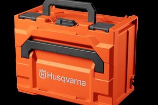 Front view of a Husqvarna tool storage box with handle.