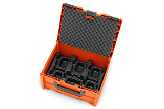 Top view of an open storage box with compartments for organizing tools or accessories.
